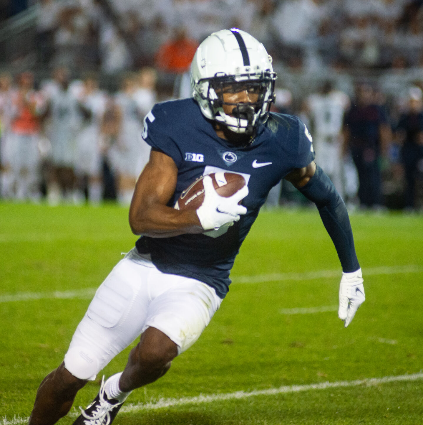 Jahan Dotson (5) runs the ball during White Out